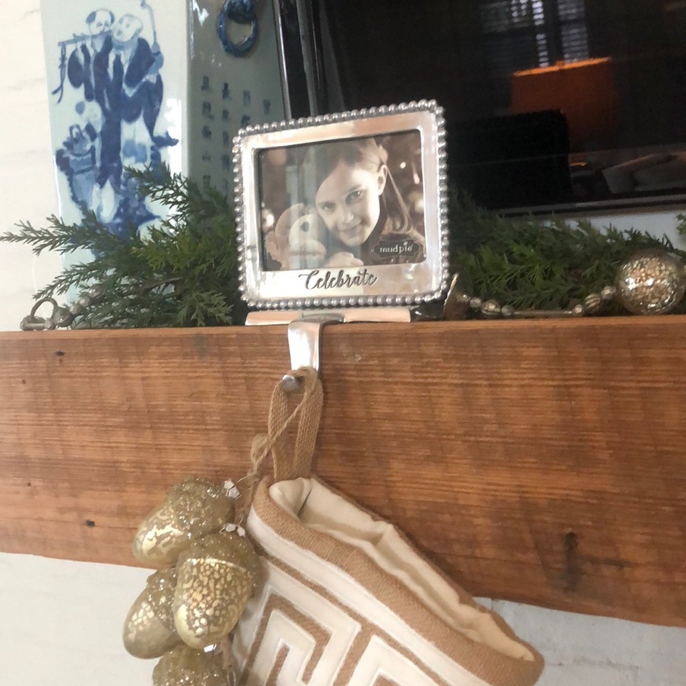 Four Pewter stocking holders